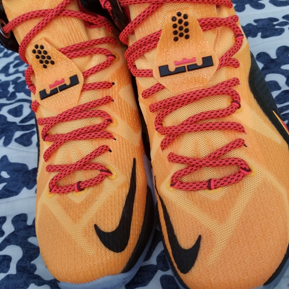 Orange and black lebron 12s; size 8 in mens